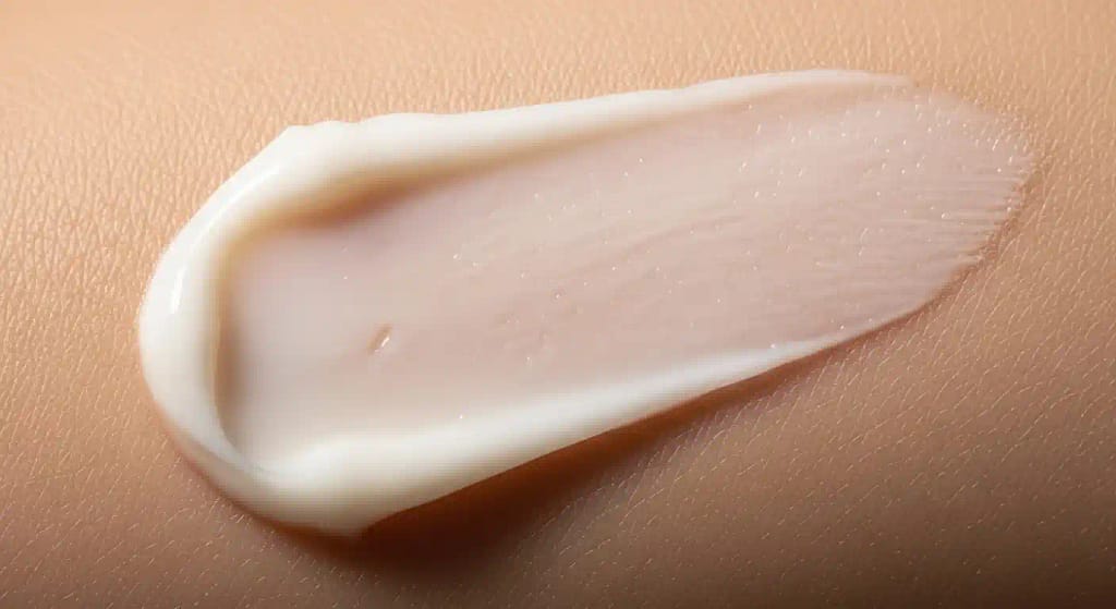 Smooth texture of Bioderma Photoderm After Sun Lotion on skin showing cooling effect