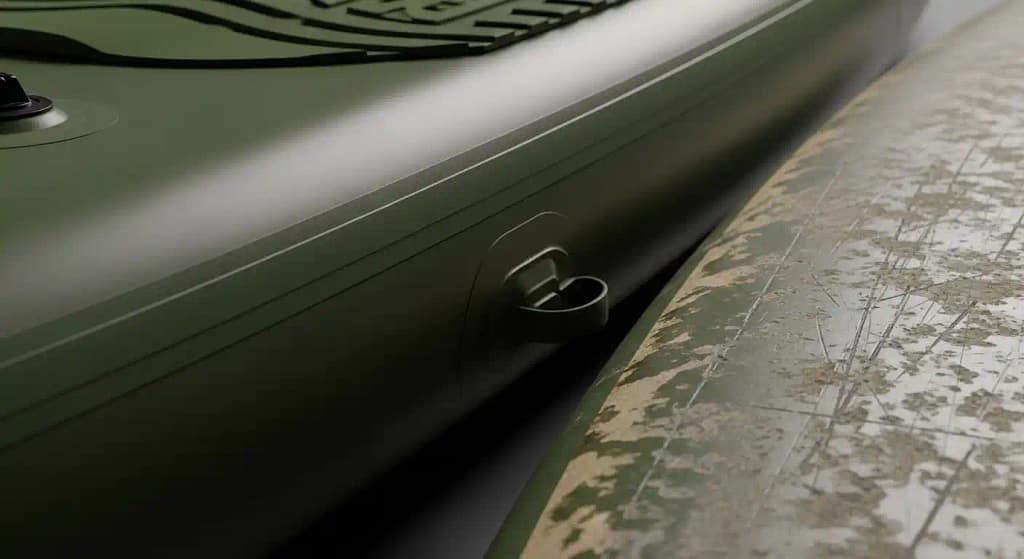 Side-by-side of inflatable and hard paddle boards showing wear and toughness