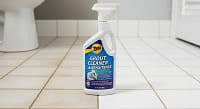 Zep 32 fl oz Grout Cleaner shown with bright clean grout lines on bathroom tiles